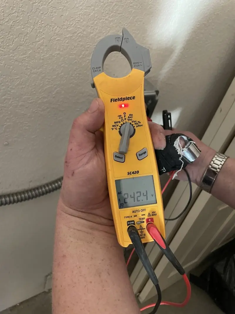 Voltage testing with clamp meter during Outlet Installation in Middletown